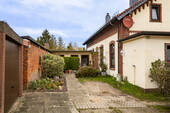 von drei Seiten geschlossener Innenhof - Mehrfamilienhaus, Wohnhaus mit 145,00 m² in Schacht-Audorf zum Kaufen