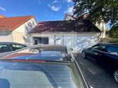 Garage und Stellplatz - 