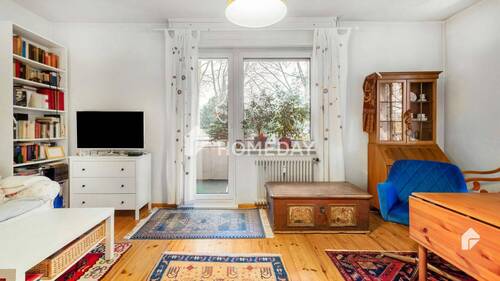 Wohnzimmer 3 - Attraktive 2-Zimmer-Wohnung mit Einbauküche und Balkon in gefragter Lage