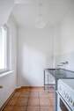 Küche mit Gasherd - 1 Zimmer Etagenwohnung in Berlin
