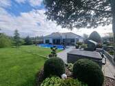 Blick zum Pool - Einfamilienhaus mit 258,00 m² in Neuruppin zum Kaufen