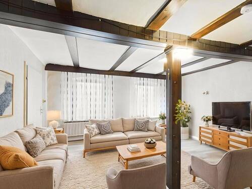 Wohnzimmer (KI) - Einfamilienhaus mit 145,60 m&sup2; in Burgpreppach zum Kaufen