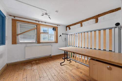 Schlafzimmer mit Dielenboden - 