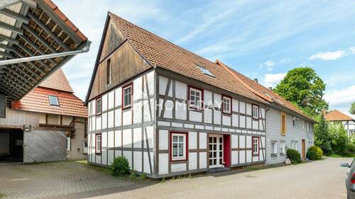 Außenansicht 3 - EFH mit ELW im Fachwerkstil - Wohnen mit Flair auf großzügigem Grundstück mit Scheune