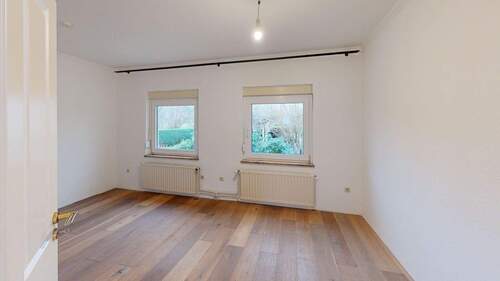 Schlafzimmer im Erdgeschoss - 