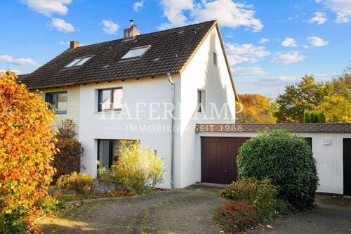 Ansicht - Charmante 4 Zimmer Doppelhaushälfte mit großem Garten und Garage