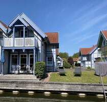 Ferienhaus mit eigenem Bootssteg im Hafendorf Rheinsberg