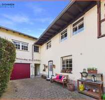 Gepflegtes Zweifamilienhaus mit Innenhof, Garage und großem Garten in Hückelhoven-Brachelen - Hückelhoven / Brachelen