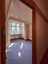 Wohnzimmer mit großen Fenstern und rückbaubarer Zwischenwand - Etagenwohnung mit 92,60 m&sup2; in Berlin zum Kaufen