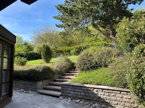 Wohnung 3: Zugang von der Terrasse zum Gartenbereich - 
