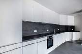 Ansicht vollausgestattete Einbauküche - Etagenwohnung mit 99,90 m&sup2; in Berlin zur Miete