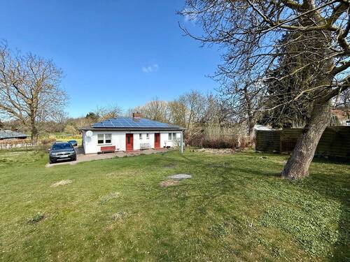 Haus-und Grundstücksansicht - 5 Zimmer Einfamilienhaus zum Kaufen in Putbus