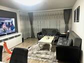 Teilansicht Wohnzimmer - Etagenwohnung mit 65,00 m² in Hockenheim zum Kaufen