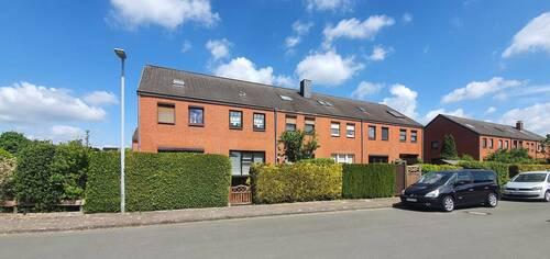 Rückwärtige Ansicht - Gepflegtes Reihenhaus mit 142m² Wohn-Nutzfläche in Weyhe-Lahausen