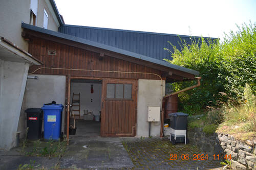 Angebaute Garage - 5 Zimmer Mehrfamilienhaus, Wohnhaus in Birkenhügel