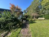 Seitenansicht Haus zum Garten - Einfamilienhaus mit 160,00 m² in Bad Sobernheim zum Kaufen