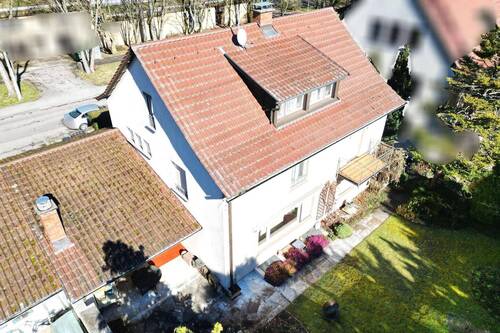 Ansicht von Südwesten - Freistehendes Einfamilienhaus mit Garten und Garage in ruhiger Wohnlage!