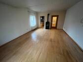 Wohn-/Esszimmmer mit Holzofen im EG Blick 1 - 