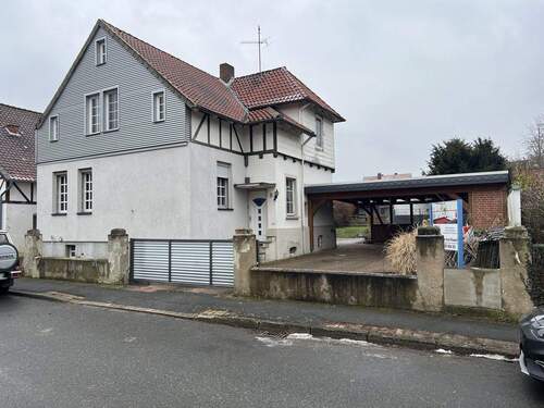 Bild 1 - Keine Provision - Einfamilienhaus mit Anbau und großem Carport ruhig gelegen zentral in Ilsede