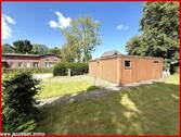 Garten mit Blick zu den Garagen - 