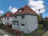 24348 LooseImmo Außensicht Gebäude - 4 Zimmer Einfamilienhaus in Lübeck-Schlutup