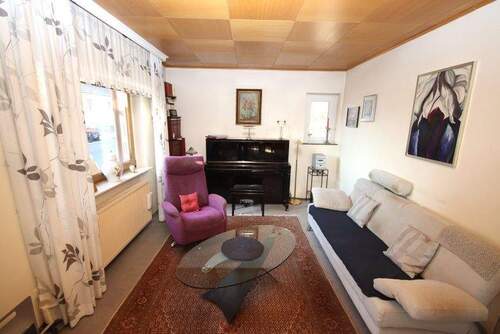 Wohnzimmer Teilansicht - 6 Zimmer Einfamilienhaus in Eschwege