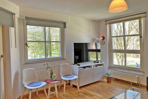 Wohnzimmer - 2 Zimmer Etagenwohnung in München