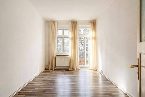Wohnzimmer - Sonnige 2-Zimmer-Wohnung in direkter Parknähe