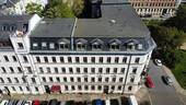 Gebäudeansicht - Cityflair trifft Wohnkomfort - Stilvolle 2-Raum-Wohnung mit Balkon