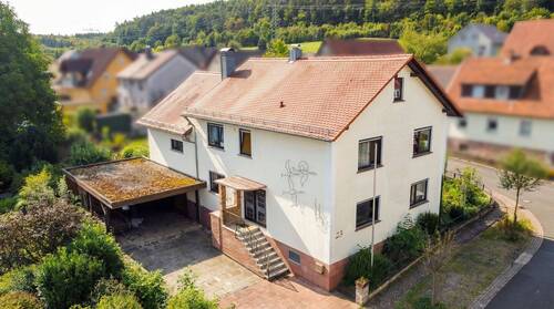 AI_Frontansicht_NGEWOJ - 9 Zimmer Mehrfamilienhaus, Wohnhaus zum Kaufen in Erlenbach bei Marktheidenfeld