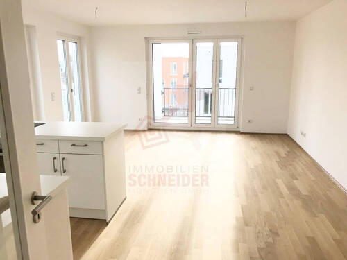 Wohnzimmer mit offener Küche - Etagenwohnung mit 70,20 m&sup2; in Vaterstetten zur Miete