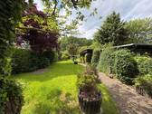 Blick auf das Baufeld - aktuelle Nutzung als Garten - Grundstück zum Kaufen in Bremen