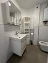 WC und Bad mit Dusche unten - 