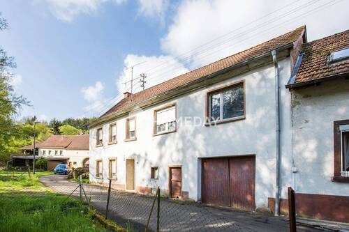 Hausansicht - Einfamilienhaus mit 95,00 m² in Offenbach-Hundheim zum Kaufen