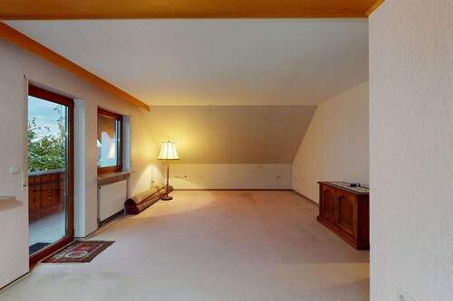 Wohnzimmer mit Balkon OG - 