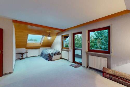 Wohnzimmer mit Balkon OG - 