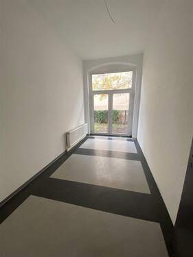 Zimmer 5 hofseitig mit Gartenzugang - 