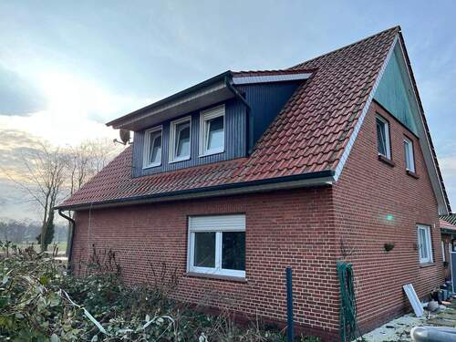 Seitliche Ansicht - Einfamilienhaus mit 150,00 m&sup2; in Emlichheim zum Kaufen