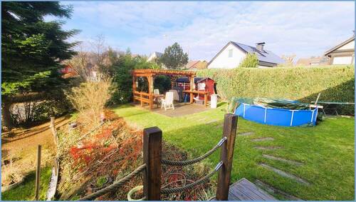 Gartenansicht mit Grillecke - Einfamilienhaus mit 159,00 m&sup2; in Overath zum Kaufen