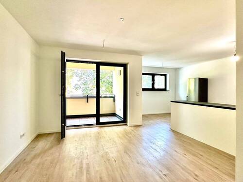 offener Wohn- Essbereich - Erstbezug nach Kernsanierung - 2 Zimmer mit Westbalkon, Einbauküche und A+ Energiekennwert