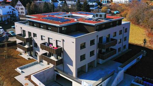 Gebäudeansicht - Bezugsfertige 2-Zimmer-Neubauwohnung mit Dachterrasse und besonderem Schnitt