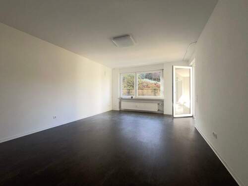 1255-03_Wohnzimmer-1.jpeg - Etagenwohnung mit 76,00 m&sup2; in Baden-Baden zum Kaufen