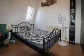 Schlafzimmer 1 im DG Bild 1 - 