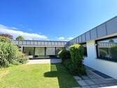 Hausansicht Rückseite - Großer Bungalow mit Einliegerwohnung in beliebter Wohnlage