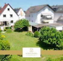 Charmantes Ein-Zweifamilienhaus in ruhiger Wohnlage mit Traumgrundstück, Sonnenterrasse + Garage - Dreieich Dreieichenhain
