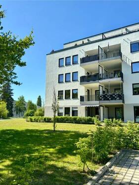 Aussenansicht - Wohnen in grüner Oase - Moderne 3-Zimmer-Wohnung mit Terrasse und kleinem Garten