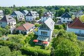 Das_Haus - AIGNER - Eleganz trifft Raumvielfalt - Einfamilienhaus mit gehobener Ausstattung in Obermenzing