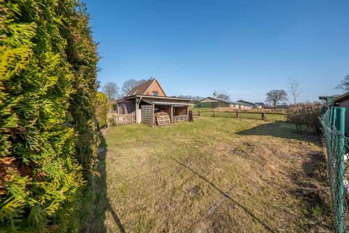 Gartenansicht - Einfamilienhaus mit 132,00 m² in Hennstedt zum Kaufen