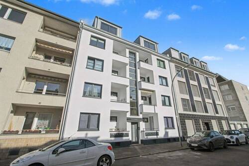 Vorderseite - Top-Investment in Köln-Mülheim: Voll vermietetes, hochwertig saniertes MFH mit 10 WE