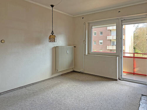 Schlafzimmer mit Zutritt zum Balkon - 